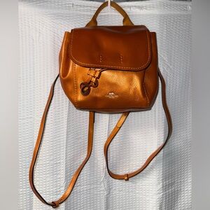 Coach Metallic Derby Backpack in tangerine orange pebbled leather